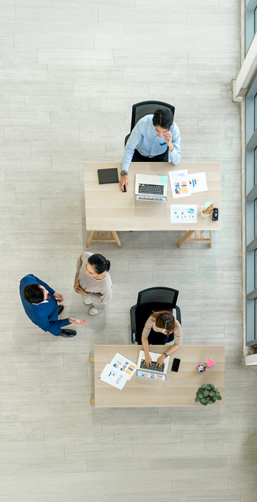 Managed IT services for small business office with team collaboration, secure laptops, and reliable business technology support